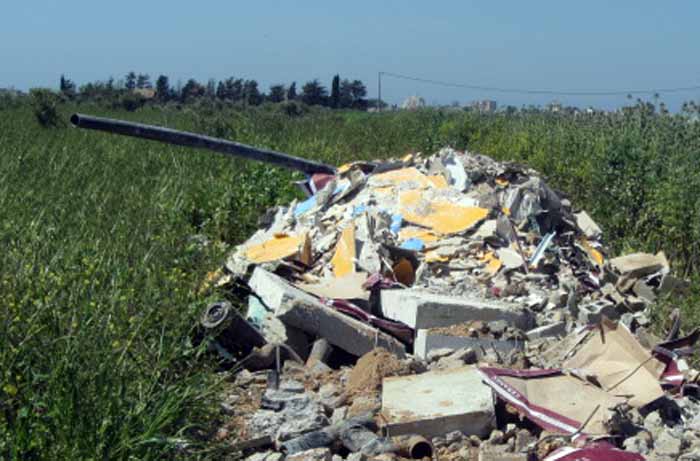 תמונת נמחשה - תיעוד השלכת פסולת בשטחים פתוחים בצפון